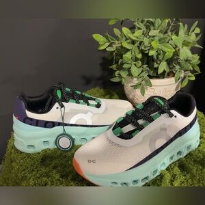 On Running Women's Shoes in White, Black, and Green